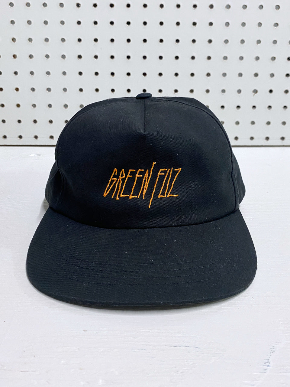 
                  
                    Green Fuz Vamp Hat Front
                  
                